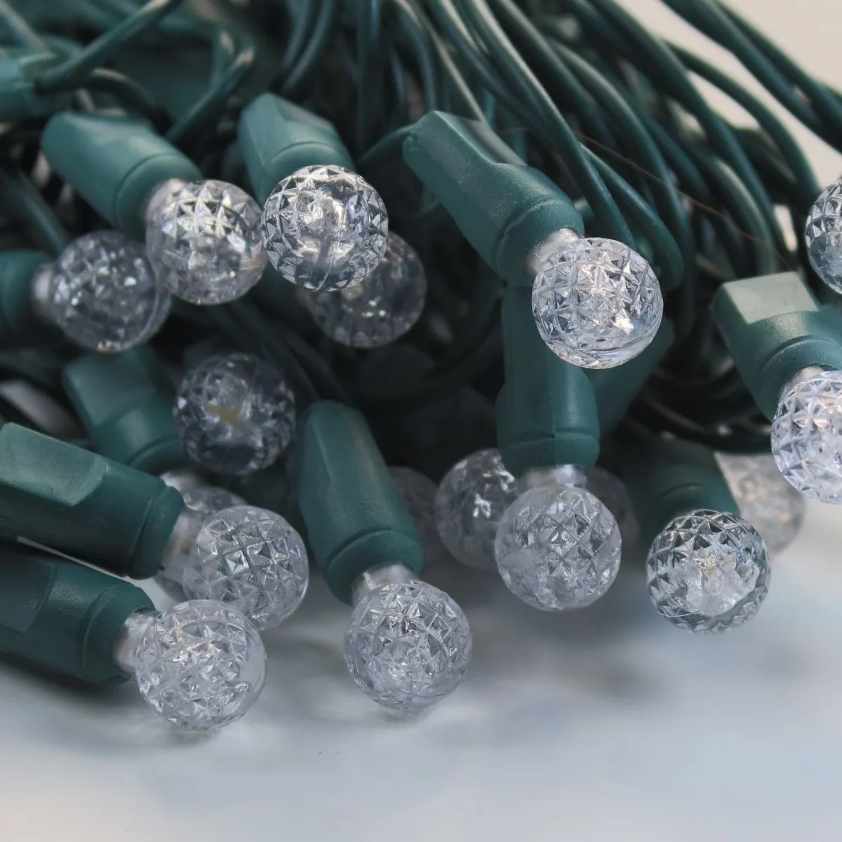 50-light  G12 Warm White LED Christmas Lights, 4" Spacing Green Wire